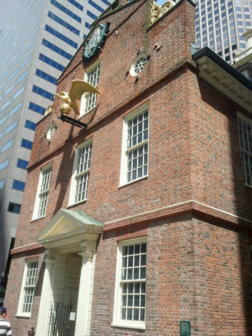 Red bricked Old State House with gold eagle in Boston