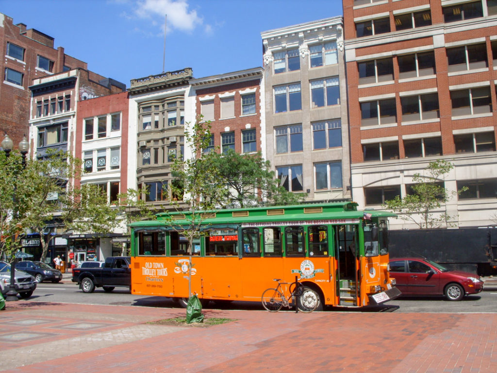 Orange and green Old Town Trolley Tour in Boston