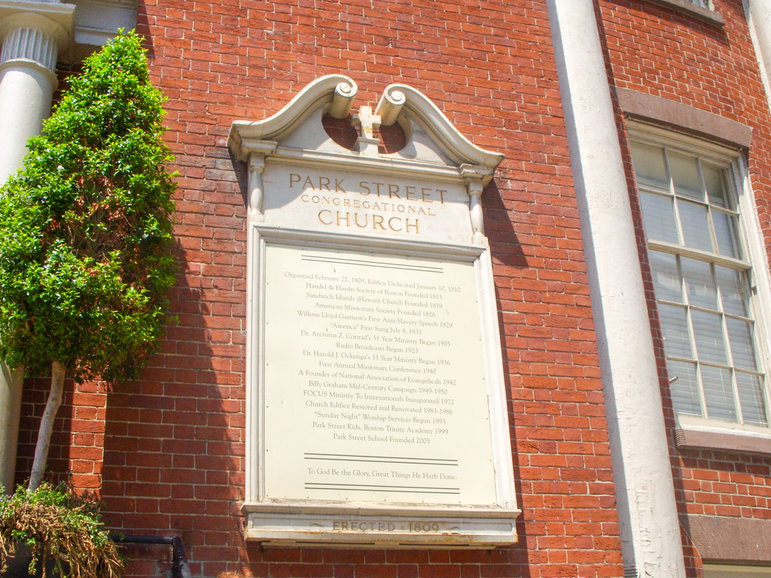 Park Street Church sign against red bricked building in Boston