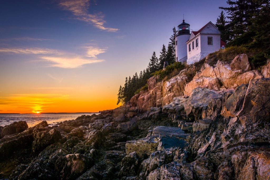 Vivid sunset over Bass Harbor Lighthouse at sunset, in Acadia National Park, Maine 