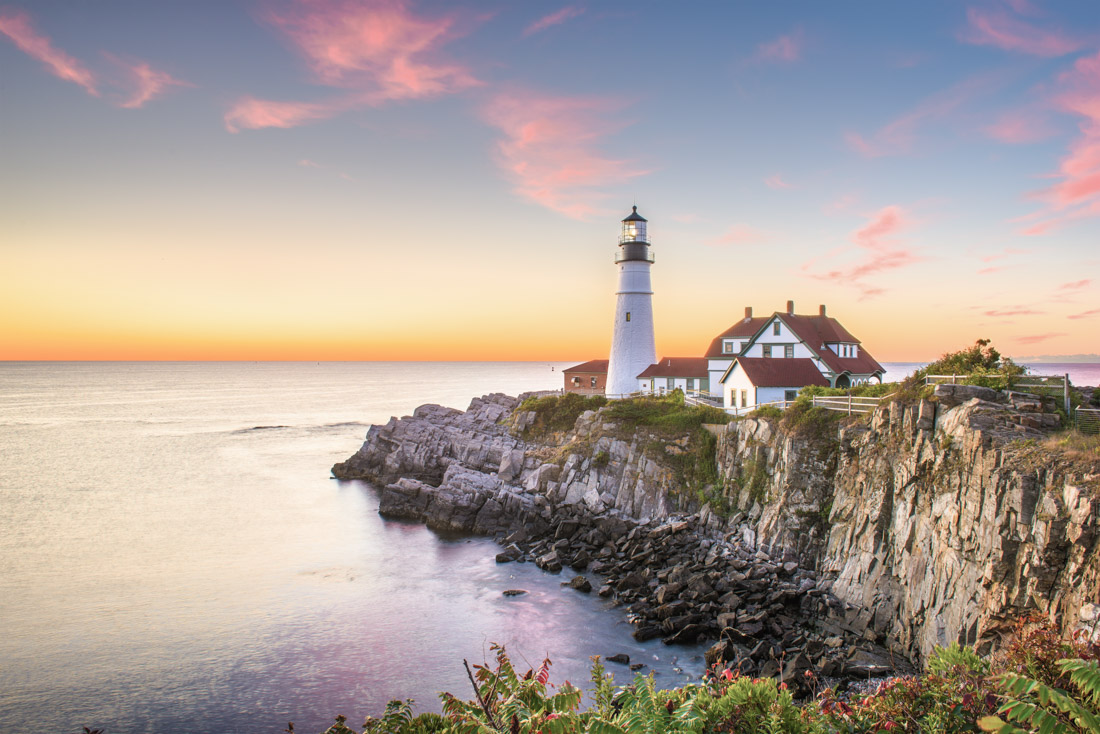 White lighthouse Cape Elizabeth, Maine at sunset