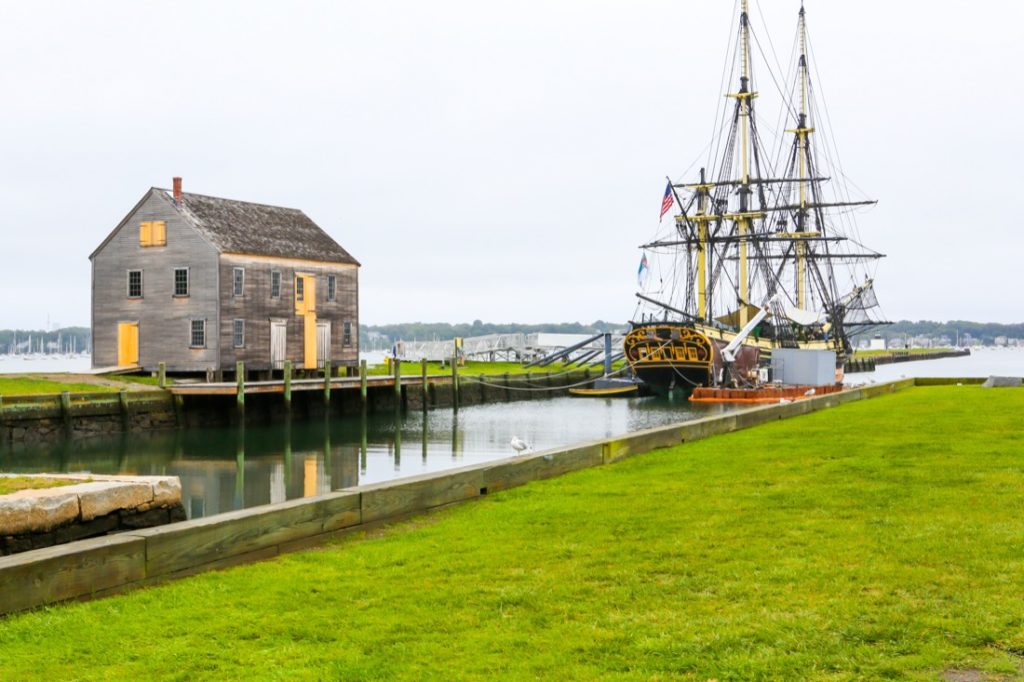 Historic ship named Three-masted Friendship anchored in Salem harbor.