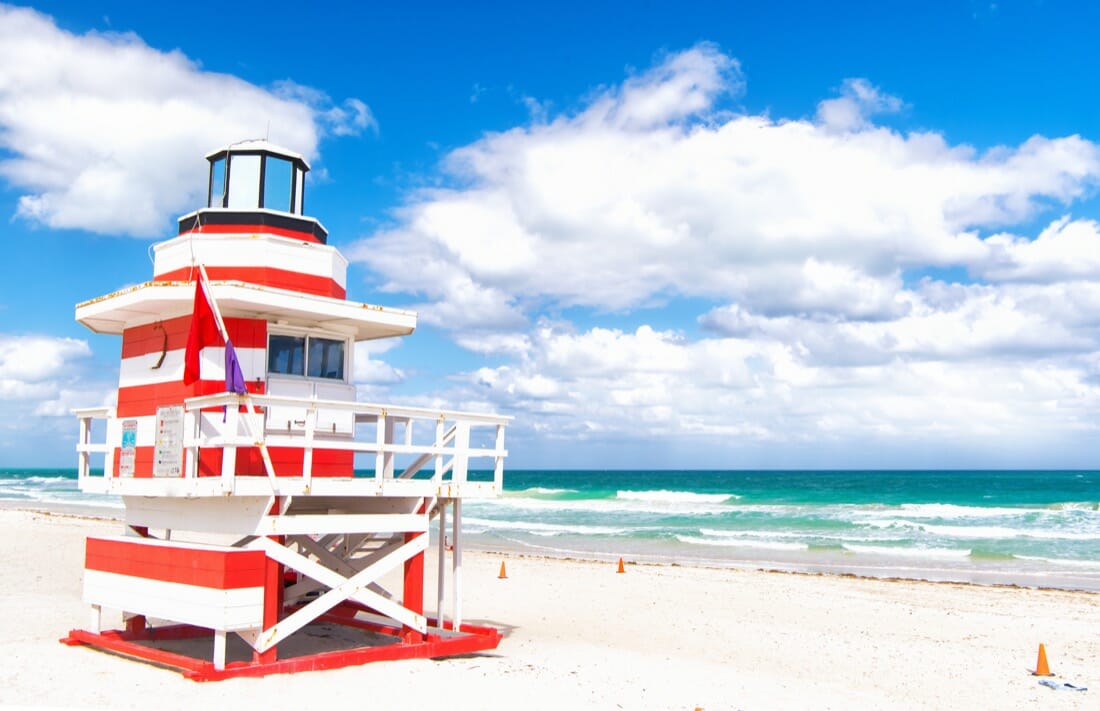 Red and White South Pointe lifeguard tower in Miami beach Florida