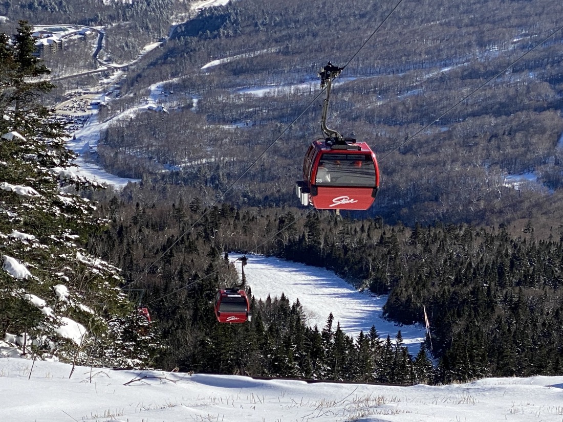 Red ski lift at Stowe mountain ski resort gondola, Vermont