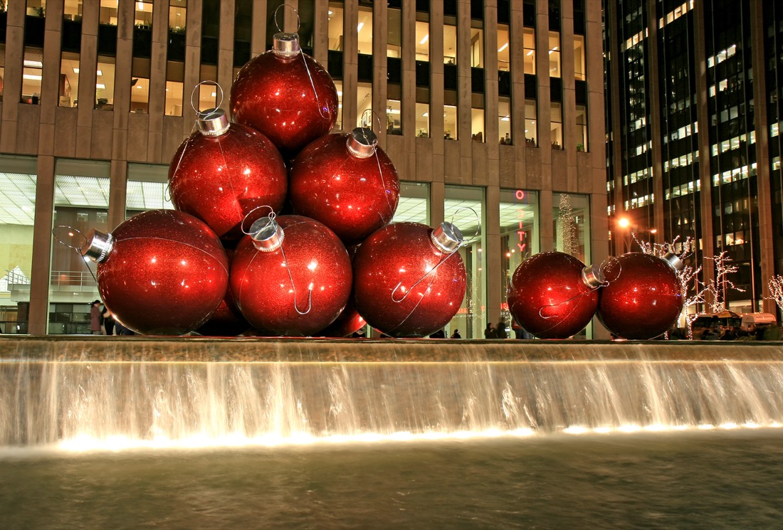 Big red bauble Christmas decor at the fountain plaza at 1251 Avenue of the Americas (Sixth Avenue) NYC