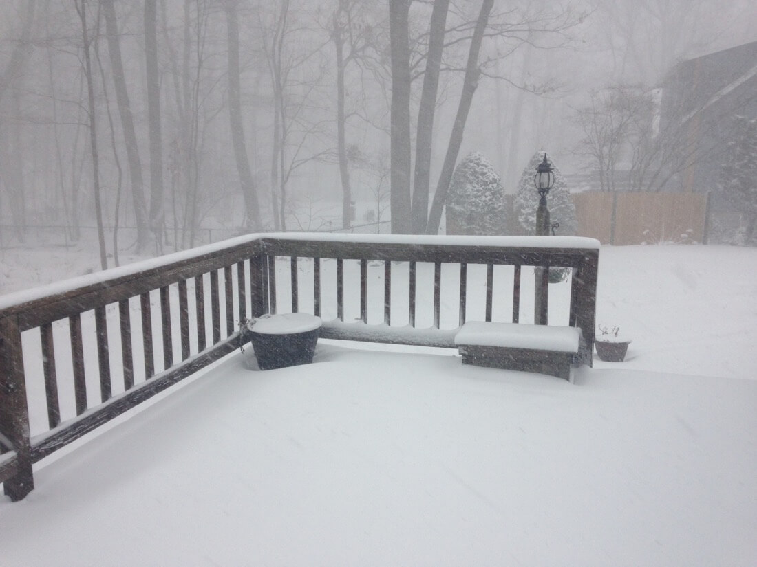 Snow covered deck in Massachusetts in winter