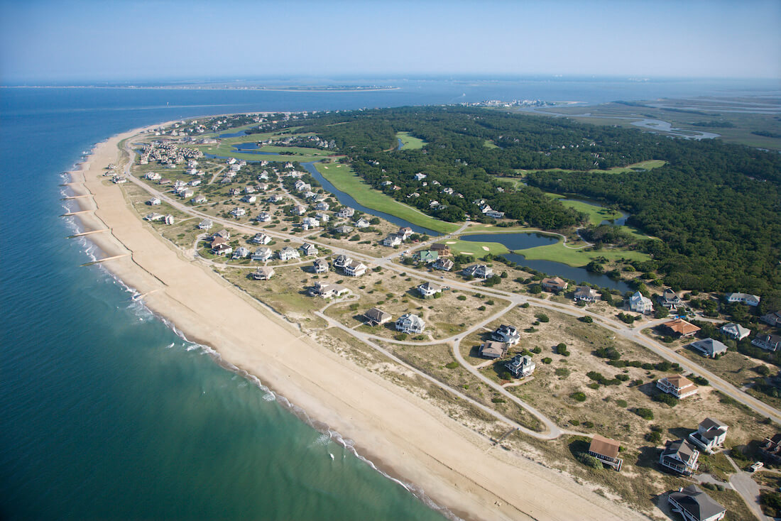 Aerial view of the beach and residential neighborhood at Bald Head Island, North Carolina