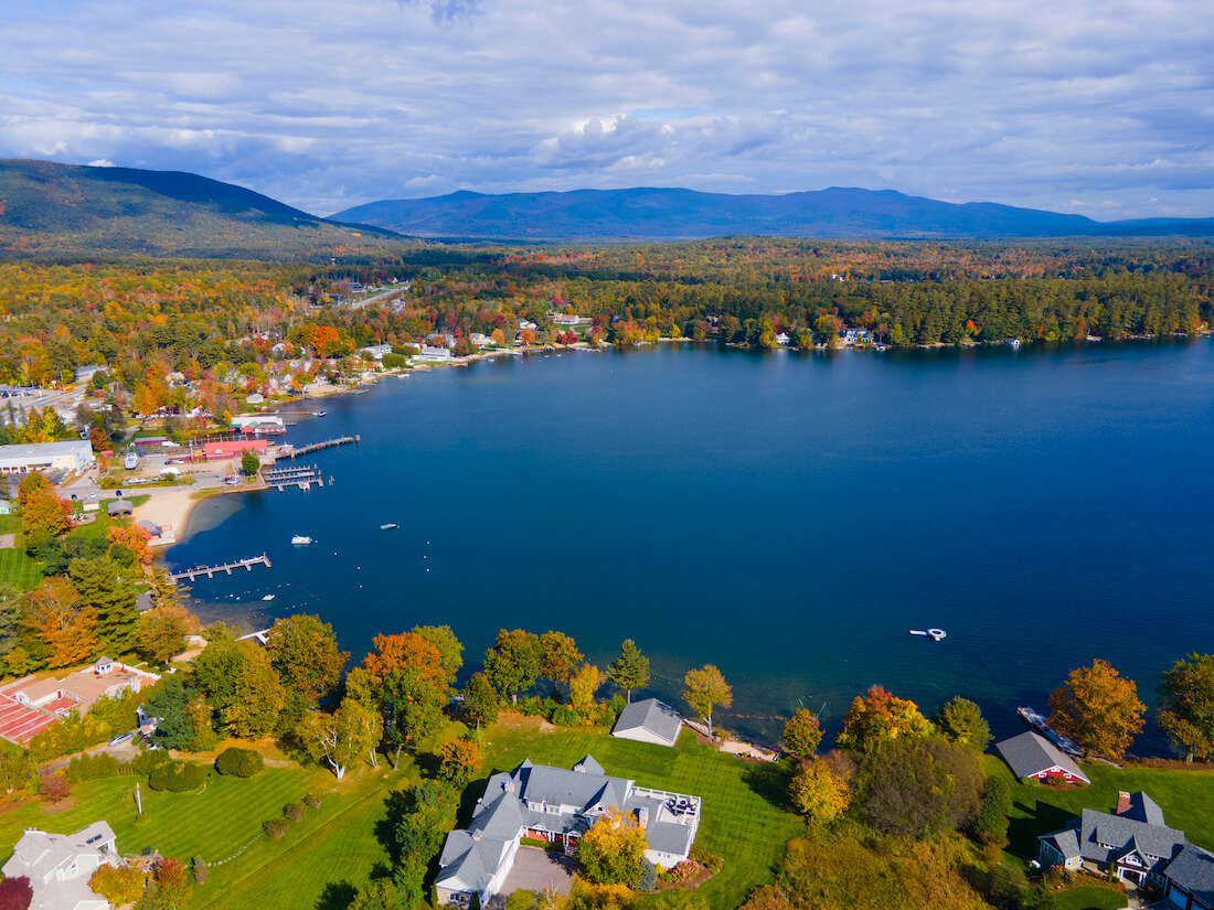 Center Harbor town center aerial view in fall with waterfront of Lake Winnipesaukee, New Hampshire