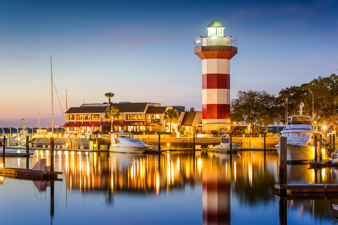 The red and white lighthouse in Harbour Town on Hilton Head Island in South Carolina at night