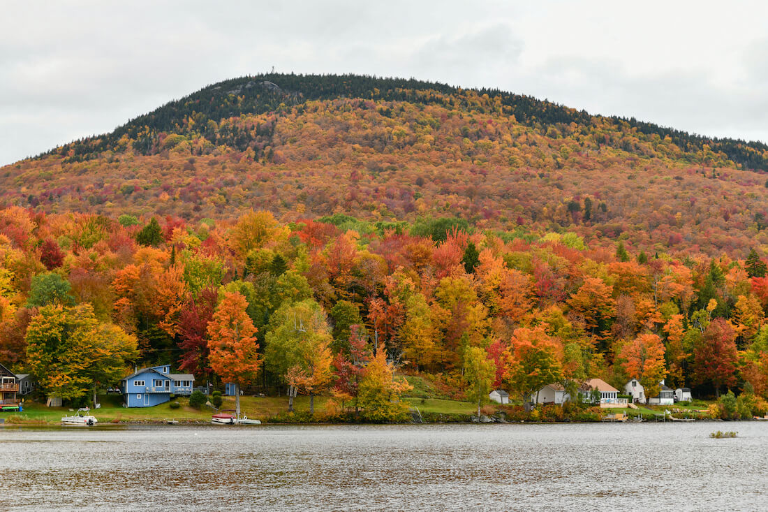 A view across Lake Elmore in Stowe Vermont in autumn
