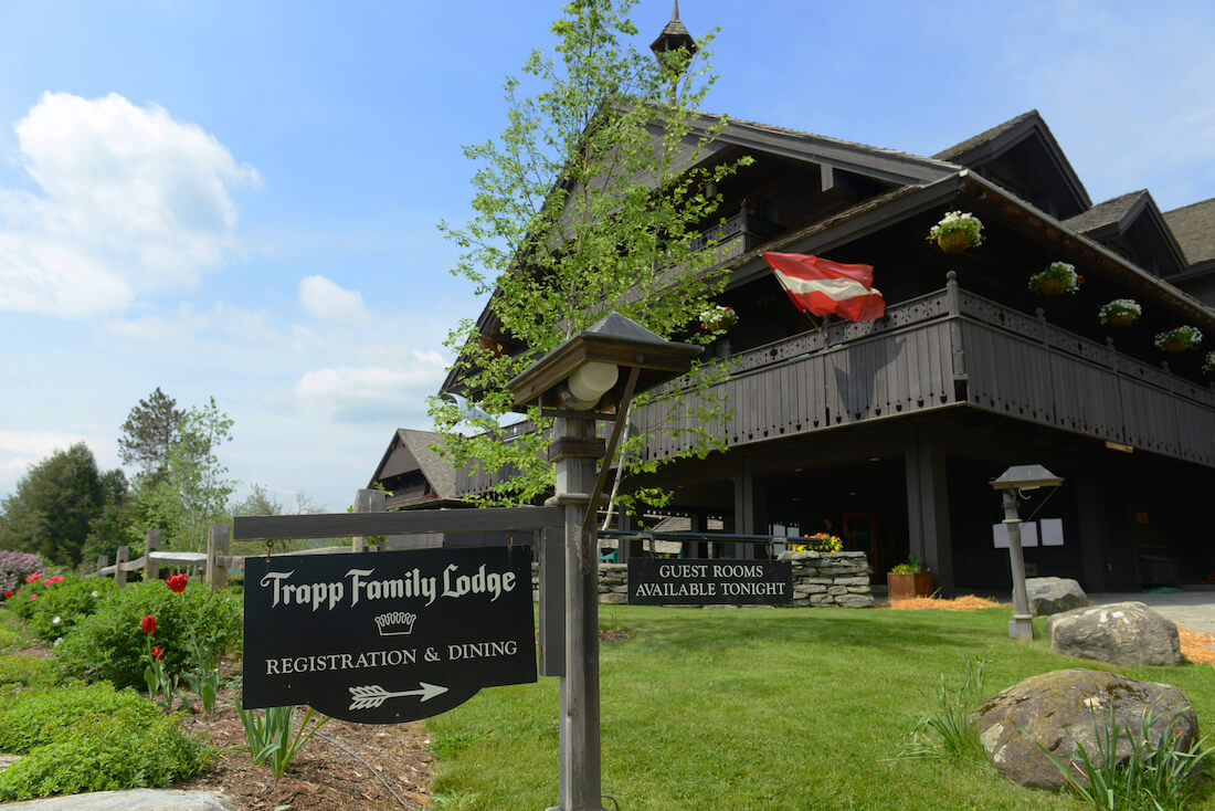 A view of the Trapp Family Lodge in Stowe Vermont on a sunny day in summer
