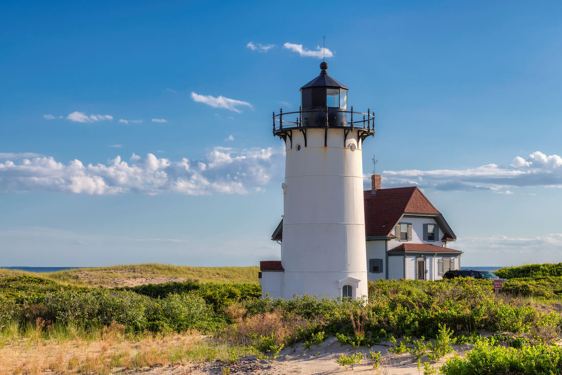 Race Point Lighthouse in Provincetown MA on a sunny day