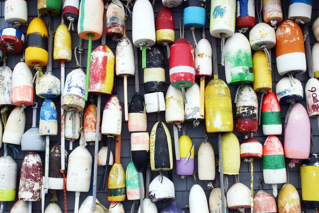 Close-up of Lobster Buoys on a wall