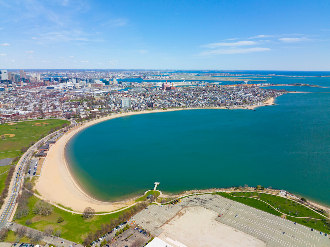 Aerial view over Carson Beach and M St Beach in Boston on a sunny day
