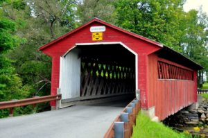 The red wooden Silk Road Covered Bridge in Bennington, Vermont