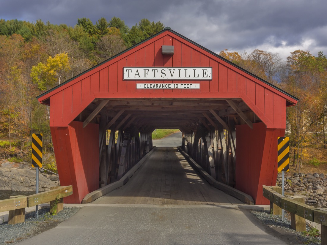 Red Taftsville Covered Bridge Vermont with fall colors