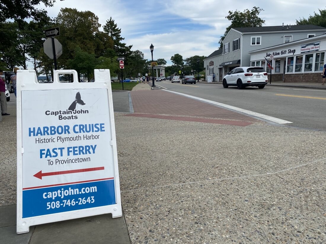 Captain John Boats sign for the fast ferry from Plymouth to Provincetown Massachusetts