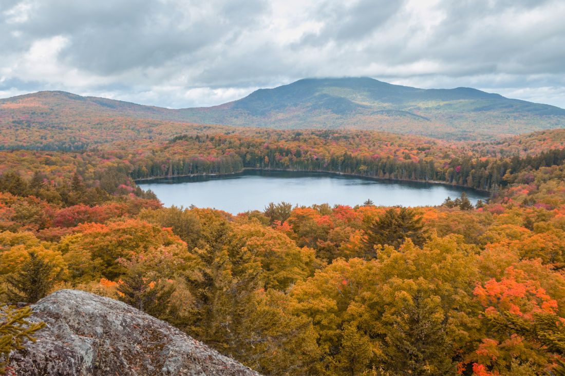 Scenic view of Moosehead lake in fall colors in Maine