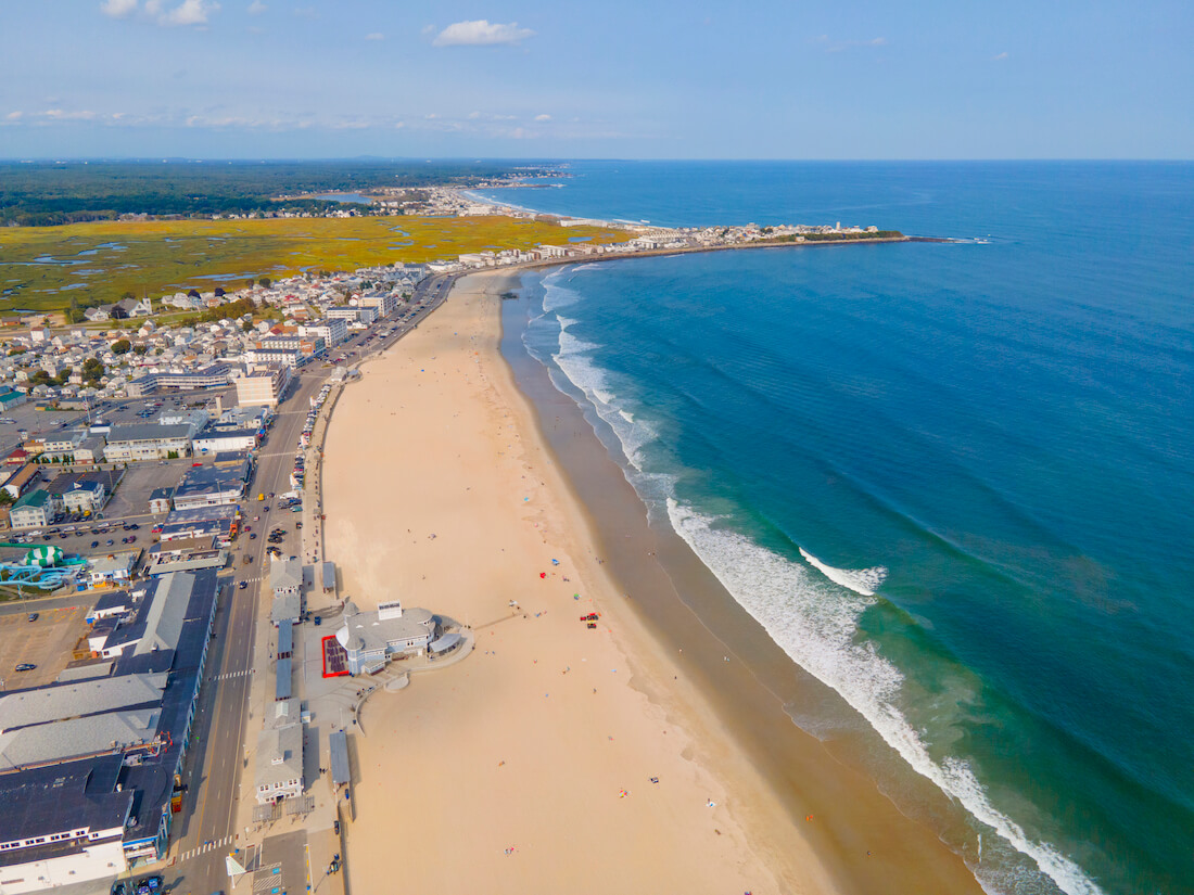 An aerial view of the long stretch of beach in Hampton New Hampshire on a clear day