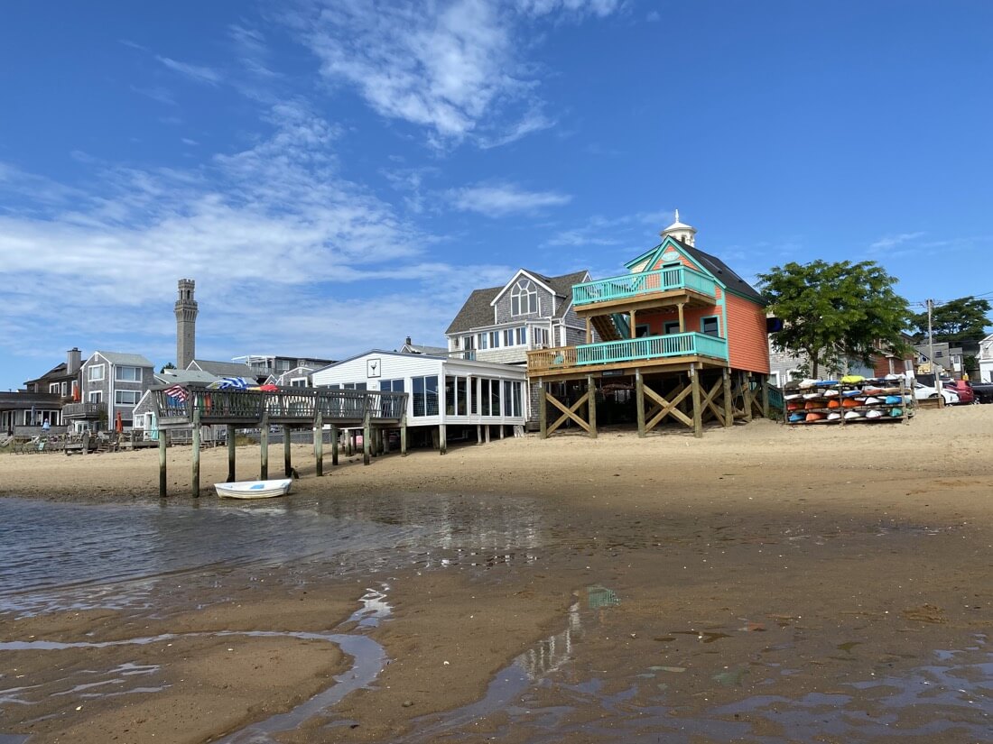 Low tide beach view and Pilgrim Monument in Provincetown Massachusetts