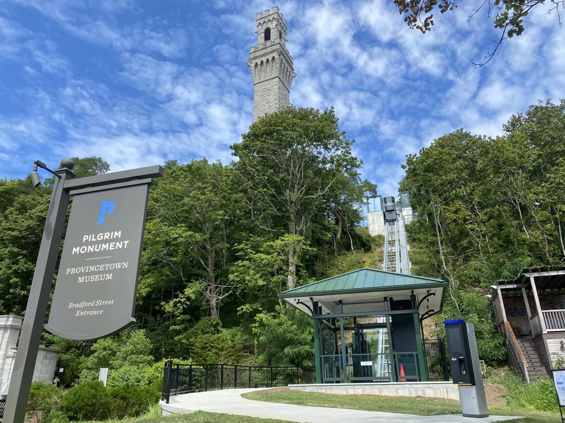 Pilgrim Monument and Provincetown Museum sign at the Bradford Street entrance in Provincetown Massachusetts