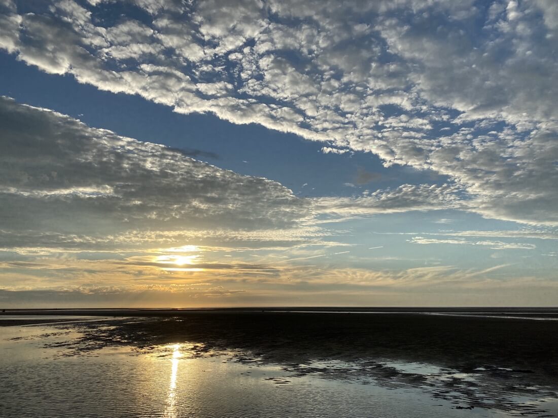 Tidal flats at Point of Rocks Landing Beach in Brewster Massachusetts at sunset