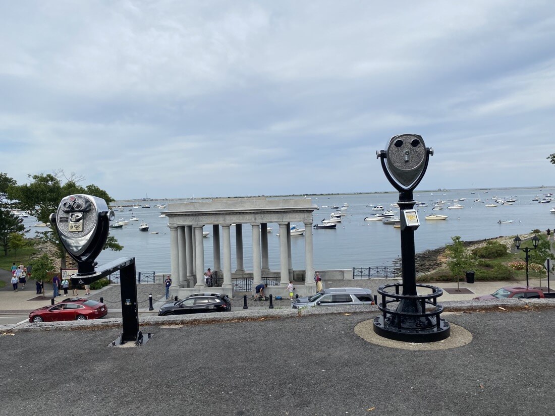 Two view finders overlooking the portico over Plymouth Rock and Plymouth Harbor in Massachusetts