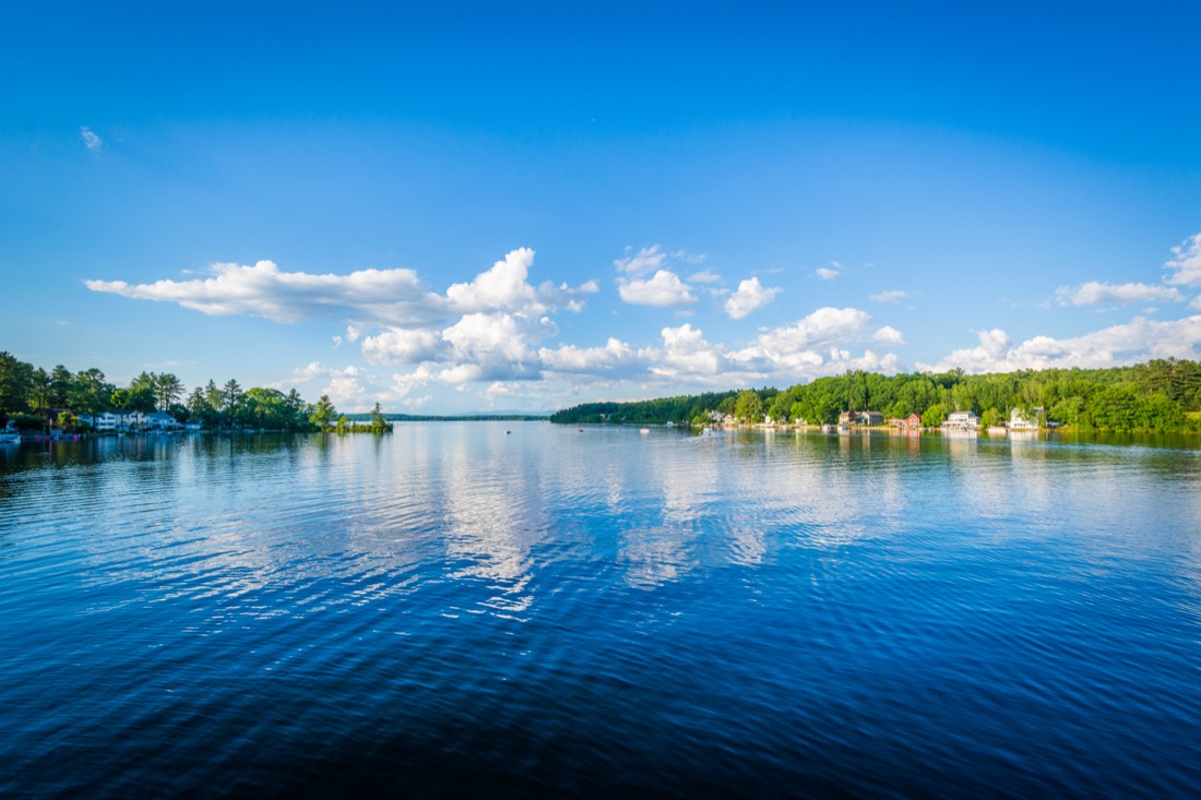 Blue skies over View of Winnisquam Lake, in Laconia, New Hampshire