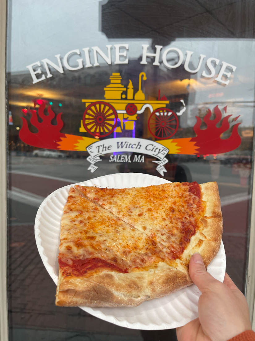 Engine House pizza pizza slices and sign in Salem Massachusetts