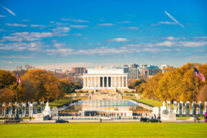 Long view of the Lincoln Memorial and Reflecting Pool in Washington DC in fall