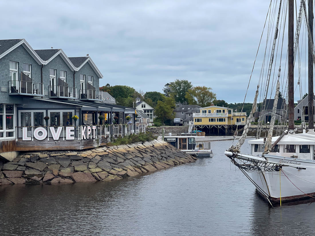 Love KPT Kennebunkport sign boat in water in Maine