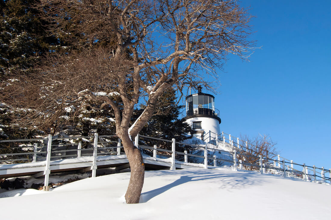 Maine Lighthouse Covered in Snow On a Hilltop - Owls Head Lighthouse near Rockland