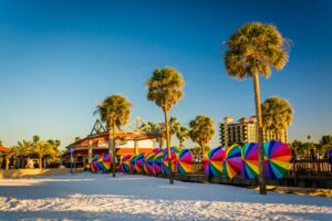 Palm trees and colorful umbrella at Clearwater Beach