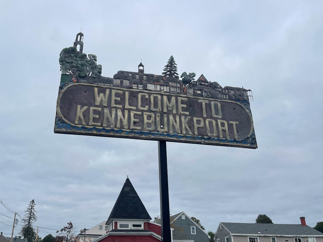 Welcome to Kennebunkport sign in Maine on an overcast day