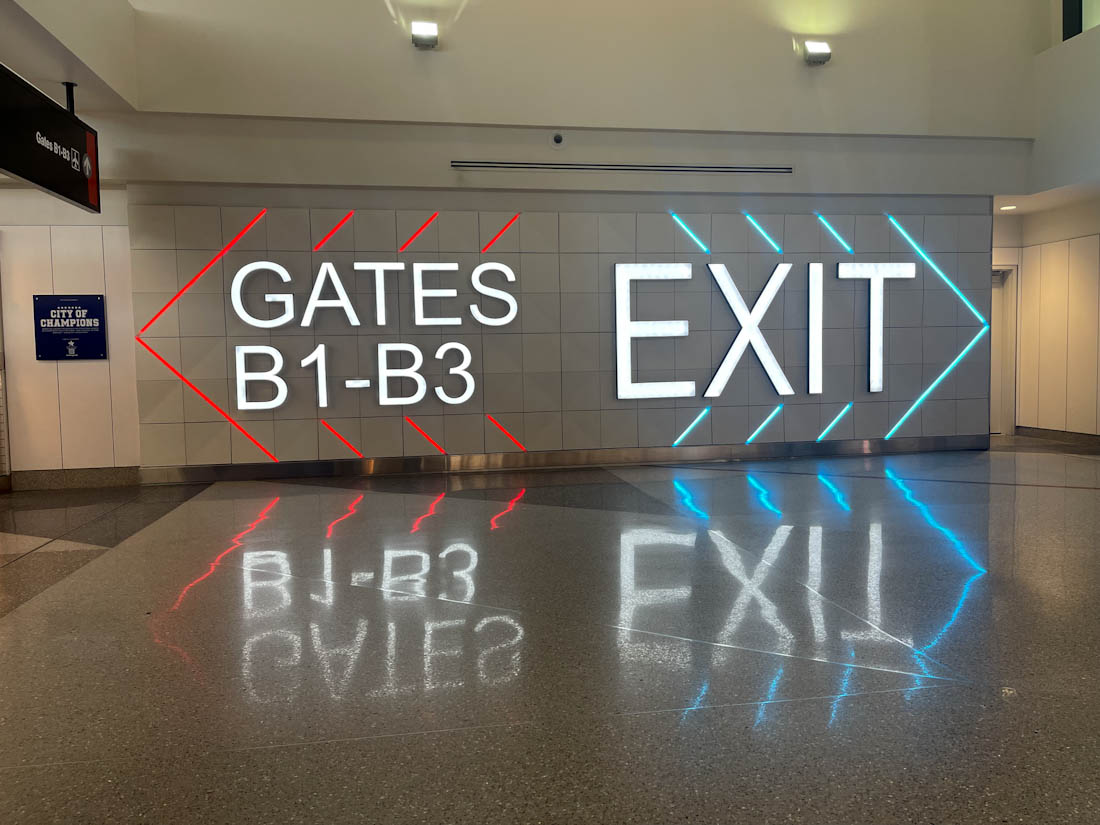 Gates sign Boston Logan Airport