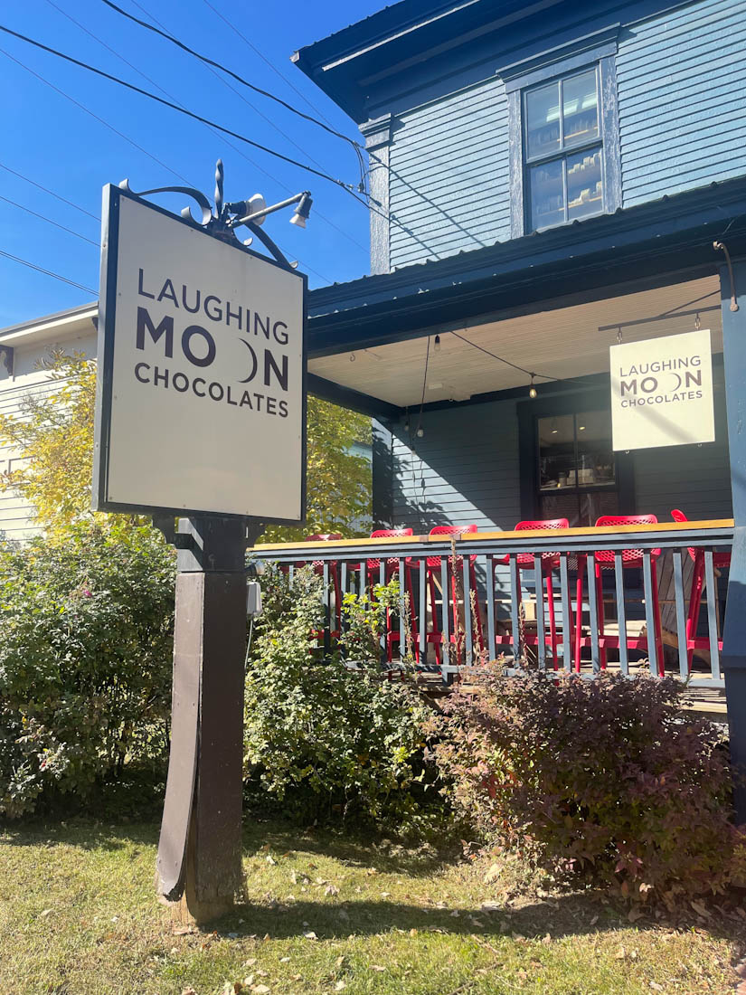 Entrance and sign for Laughing Moon Chocolates in Stowe Vermont