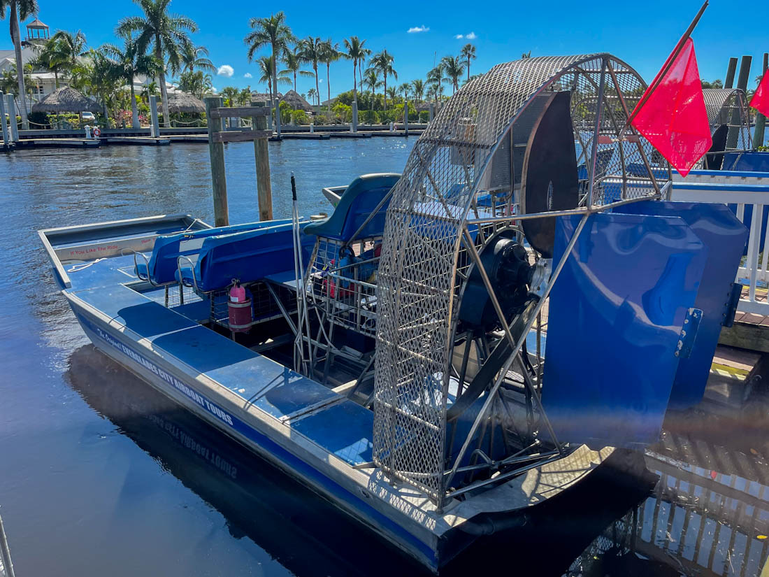 Everglades Airboat Tours on water palm trees Florida