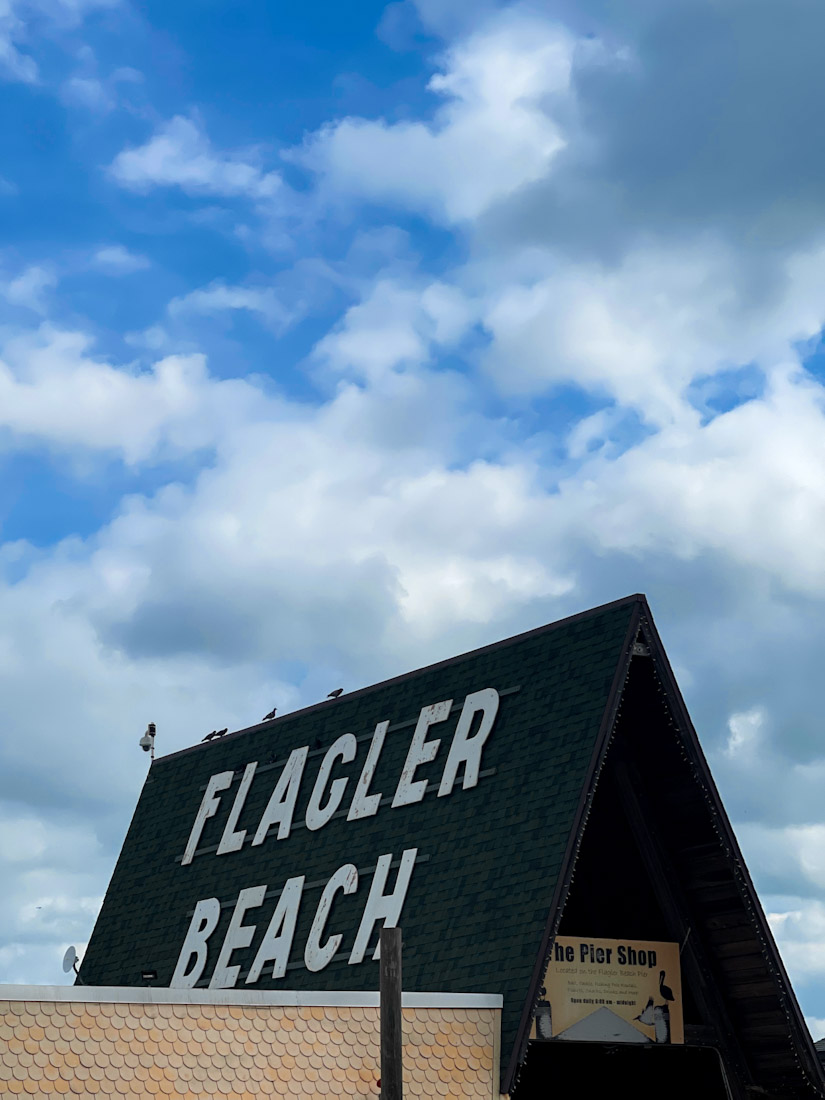 Flagler Beach sign on roof in Florida