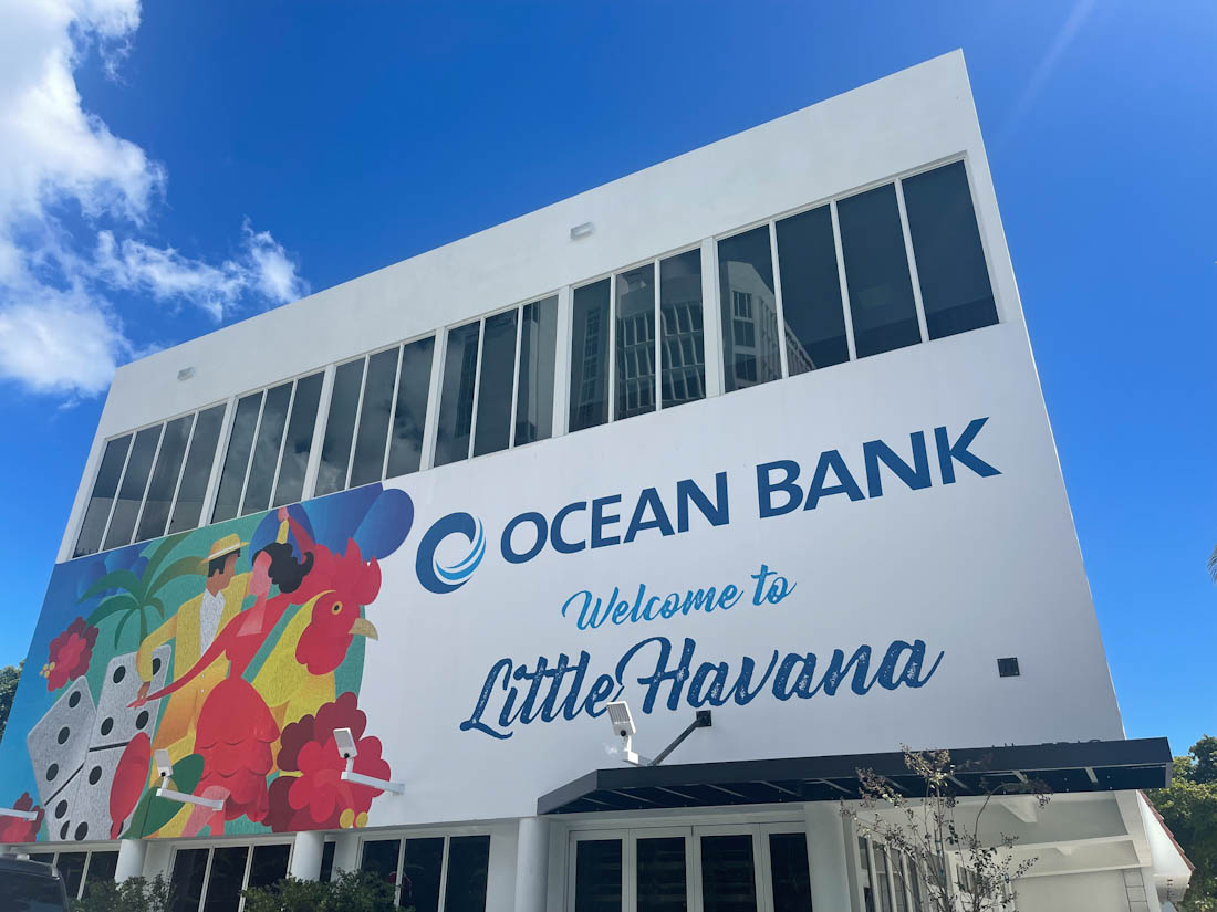 Welcome to Little Havana Ocean Bank mural on white building 