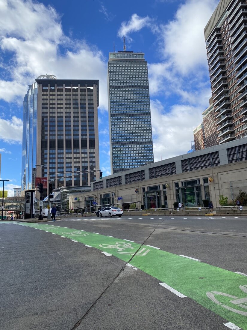 Prudential Center and a green bike lane on Huntington Ave in Boston Massachusetts