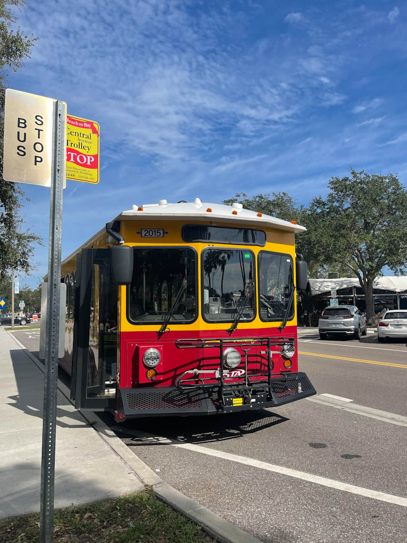 St Pete Trolley painted red and yellow in Florida 