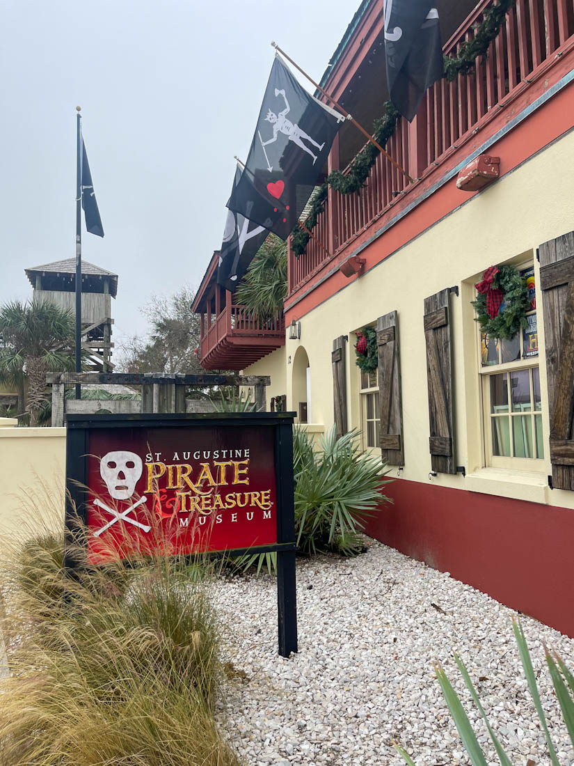 Sign for Pirate Treasure Museum outside red and yellow building in St Augustine Florida