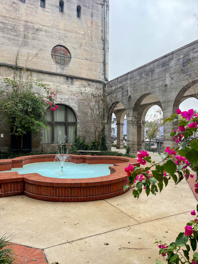 The Lightner Museum Hotel Alcazar garden with pink flowers in St Augustine Florida