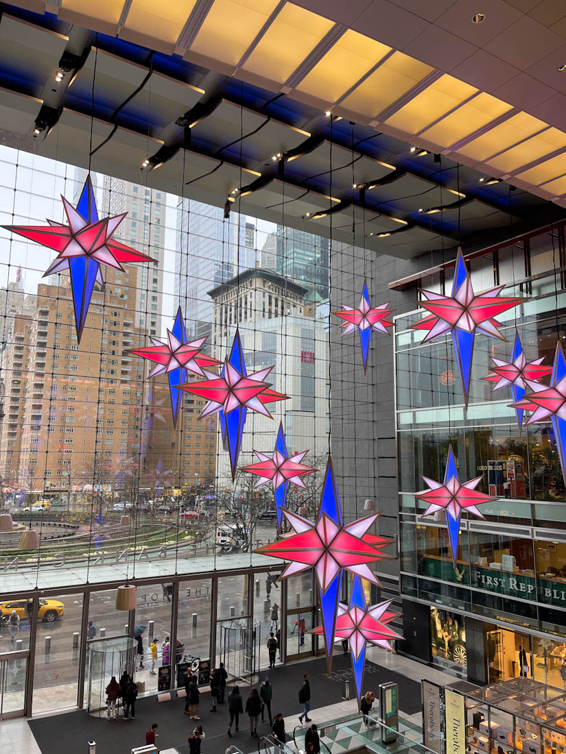 Stars hanging from roof of The Shops at Columbus Circle 