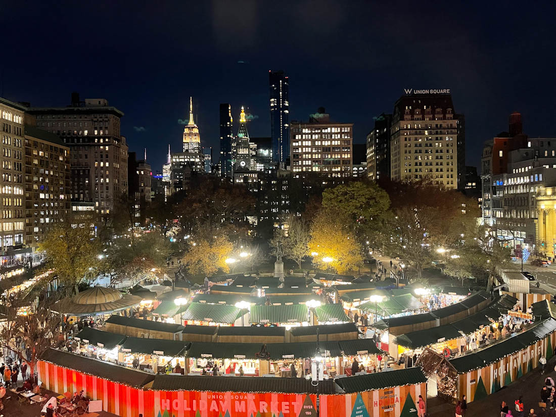 Union Square Holiday Market lit up at night