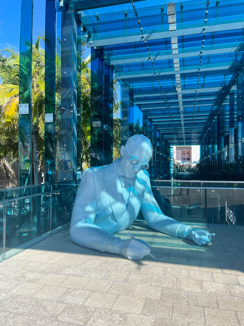 Statue with glasses writing, Le Corbusier statue by Xavier Veilhan Design District Miami Florida