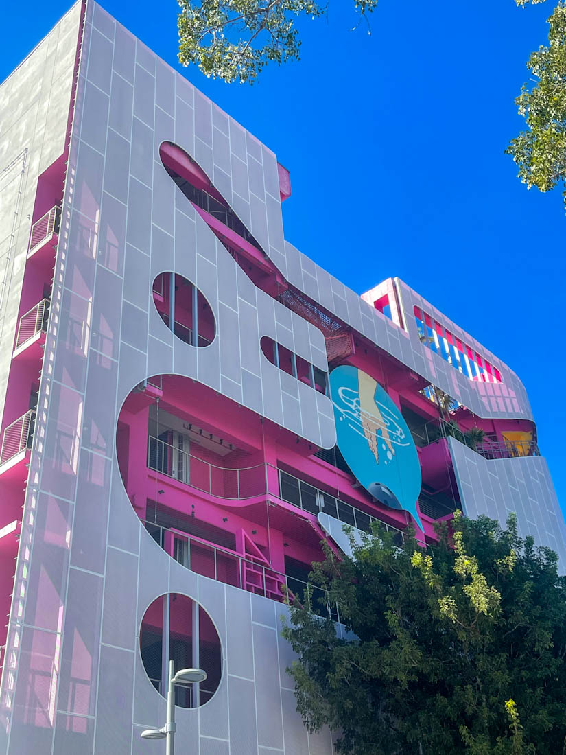 Pink building with abstract shapes of Museum Garage Design District Miami