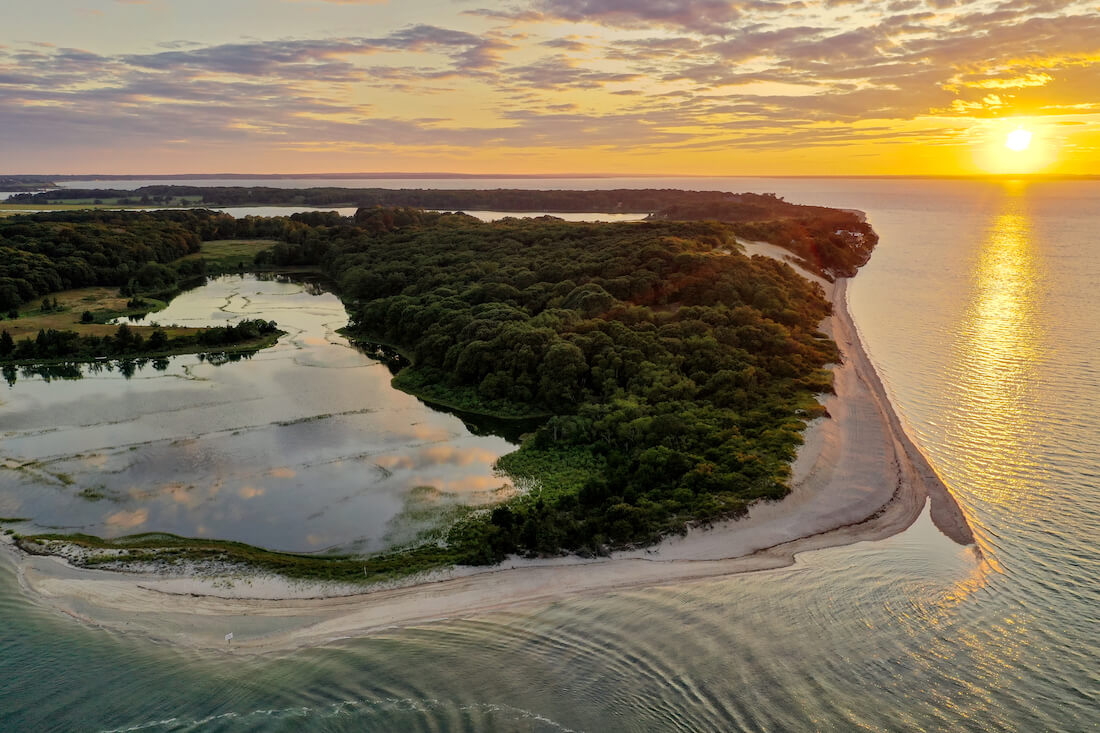 Aerial view of sunset along the beach at Towd Point in Southampton, Long Island, New York