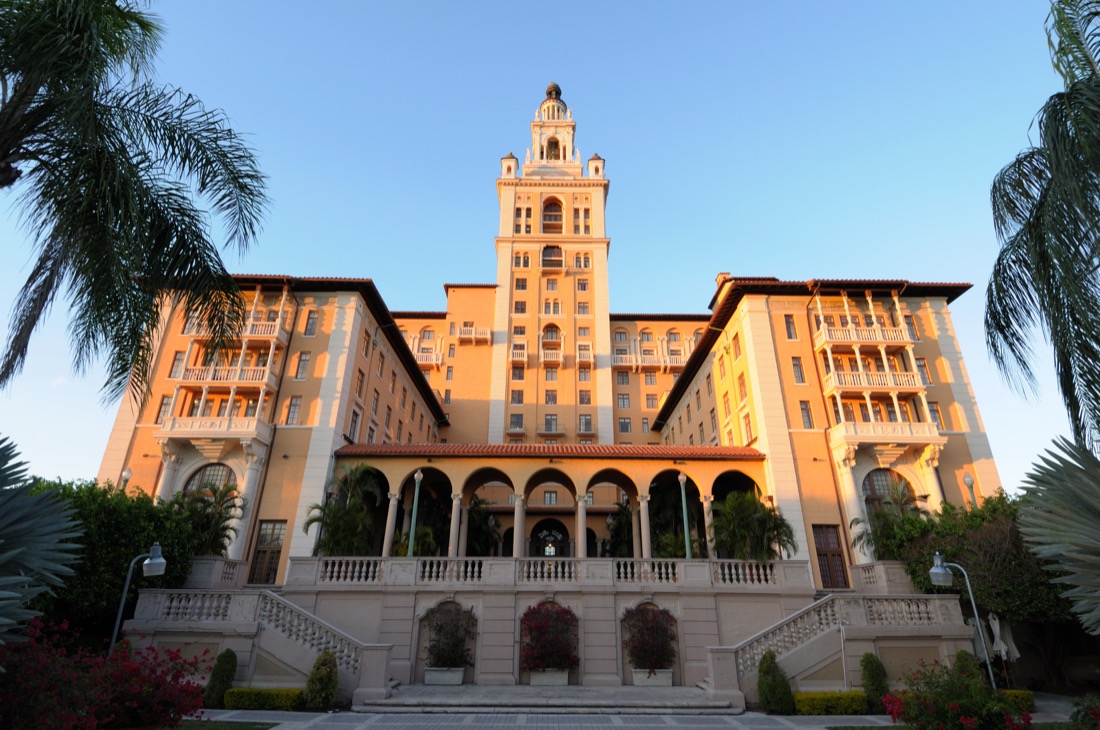 Orange toned historic building of The historic Biltmore Hotel in Coral Gables, Miami 
