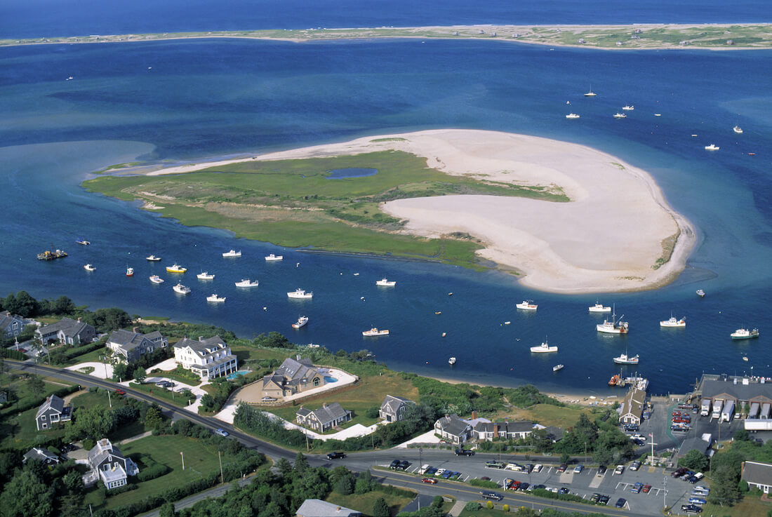 Aerial view including Chatham Pier Fish Market and Chatham Harbor seen on Cape Cod in Massachusetts